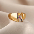 Wide personalized ring with rainbow initial