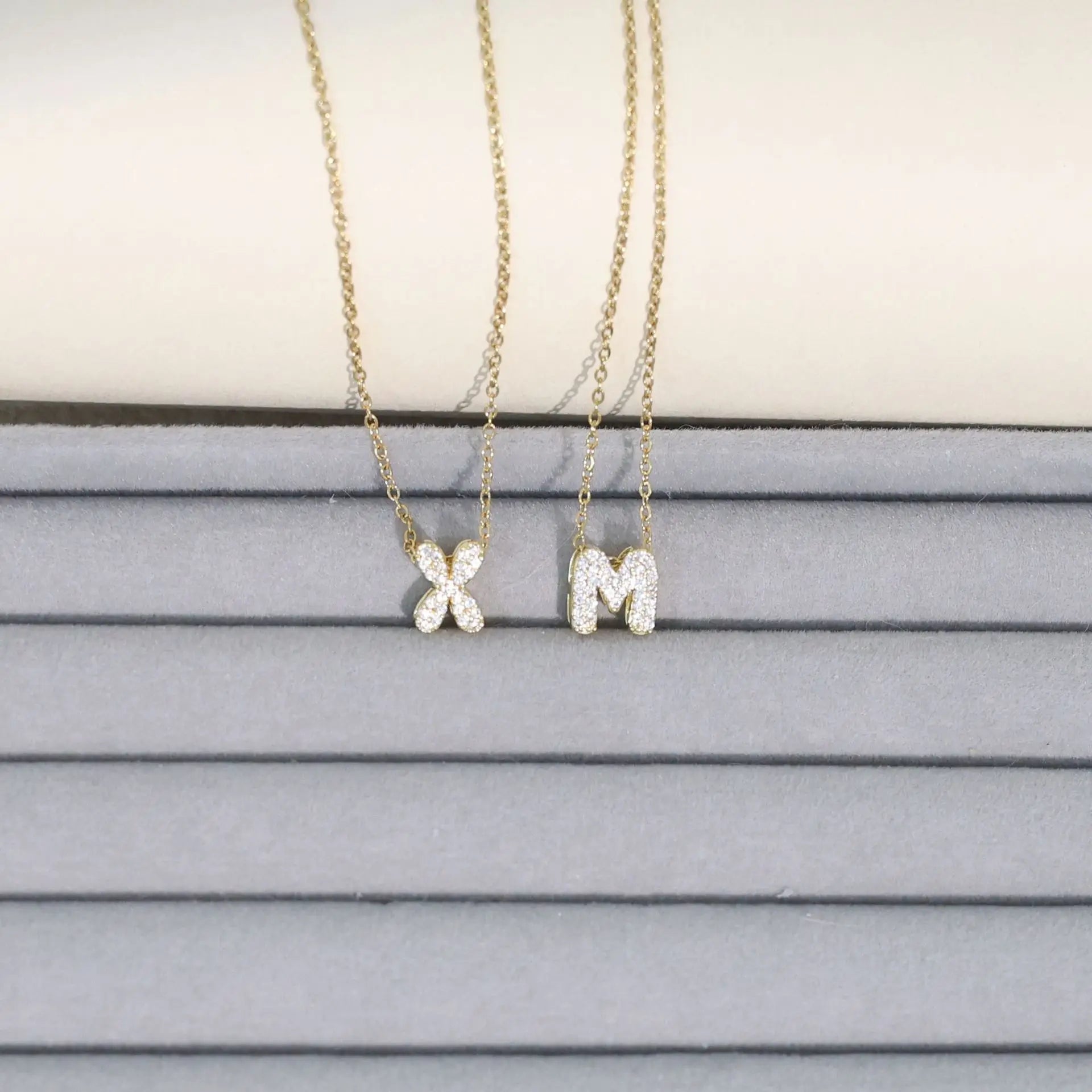 Women's choker necklace with minimalist initial pendant