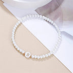 White bracelet initial B