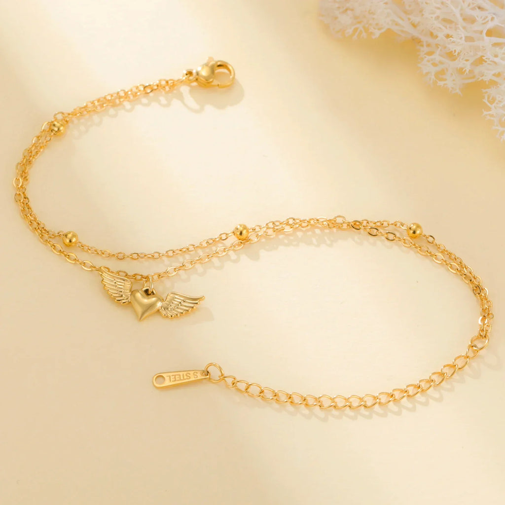 Adjustable angel wings gold bracelet