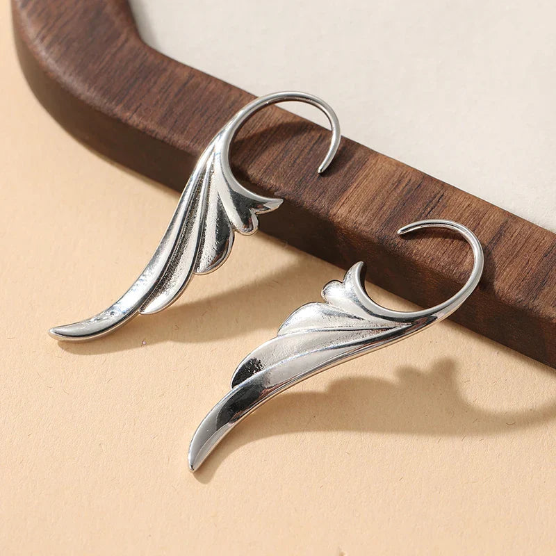 Silver women's angel wing dangle earrings