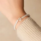 White bracelet initial O