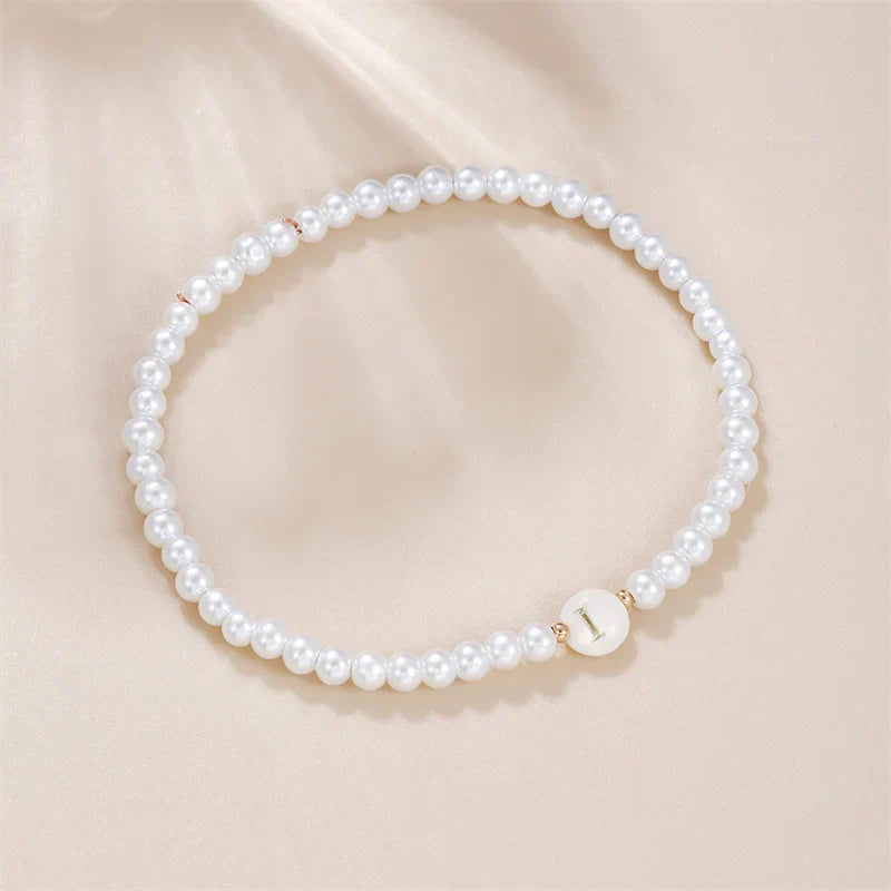 White bracelet initial I