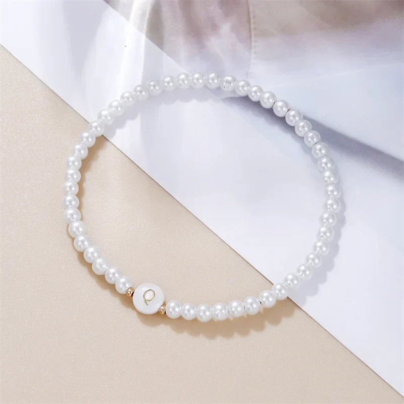 White bracelet initial Q