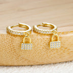 Key and lock hoop earrings with rhinestones gold