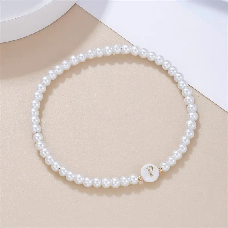 White bracelet initial P