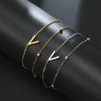 Double initial bracelet in gold and silver  v