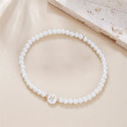 White bracelet initial H