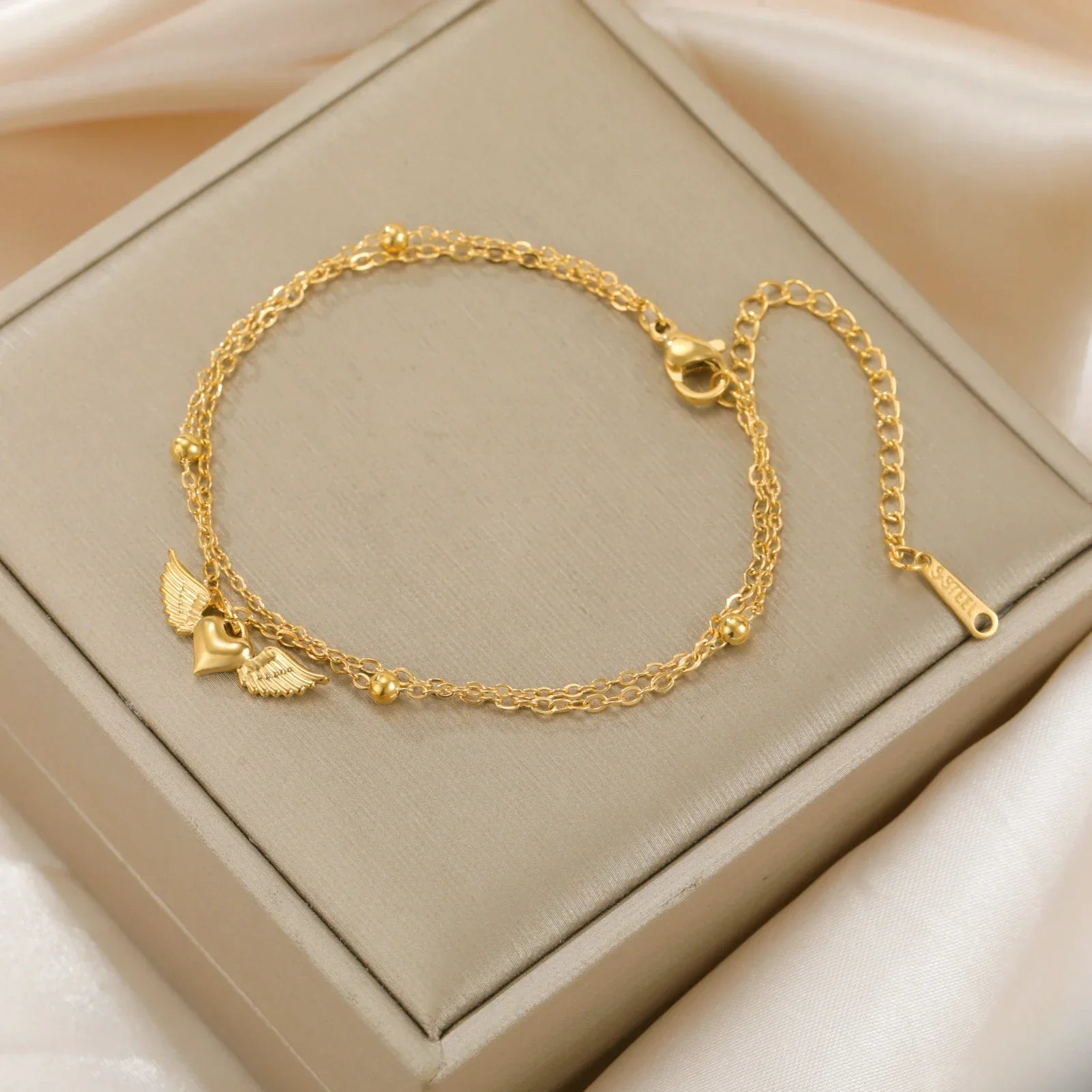 Adjustable angel wings gold bracelet