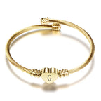 Heart bracelet with initial gold g