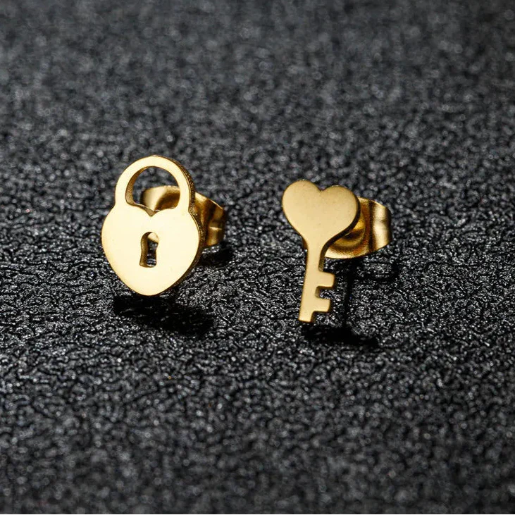 Minimalist key and lock earrings gold