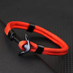 Black double-anchor bracelet orange