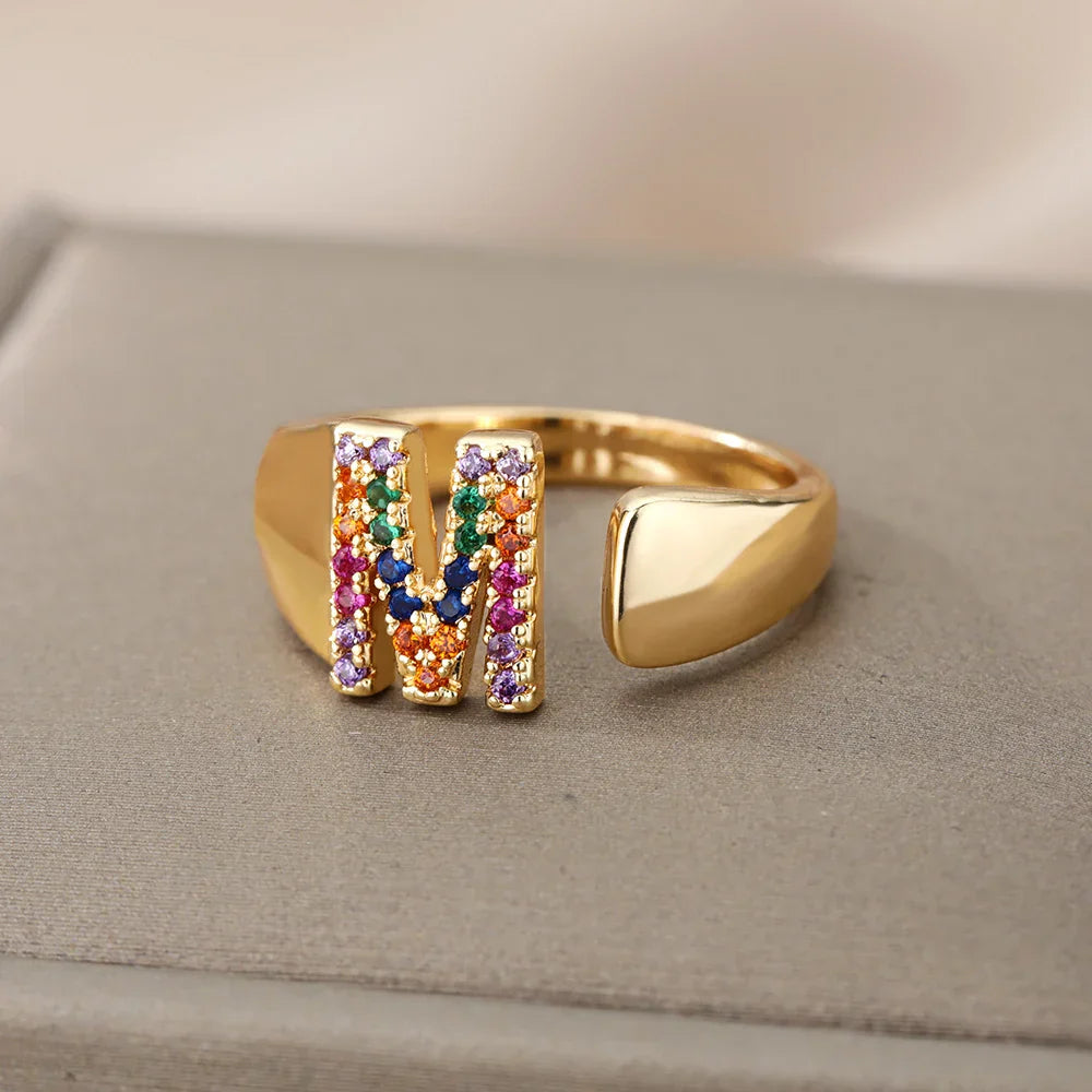 Wide personalized ring with rainbow initial m