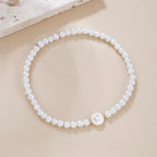 White bracelet initial C