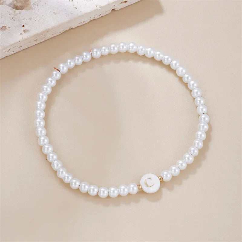 White bracelet initial C