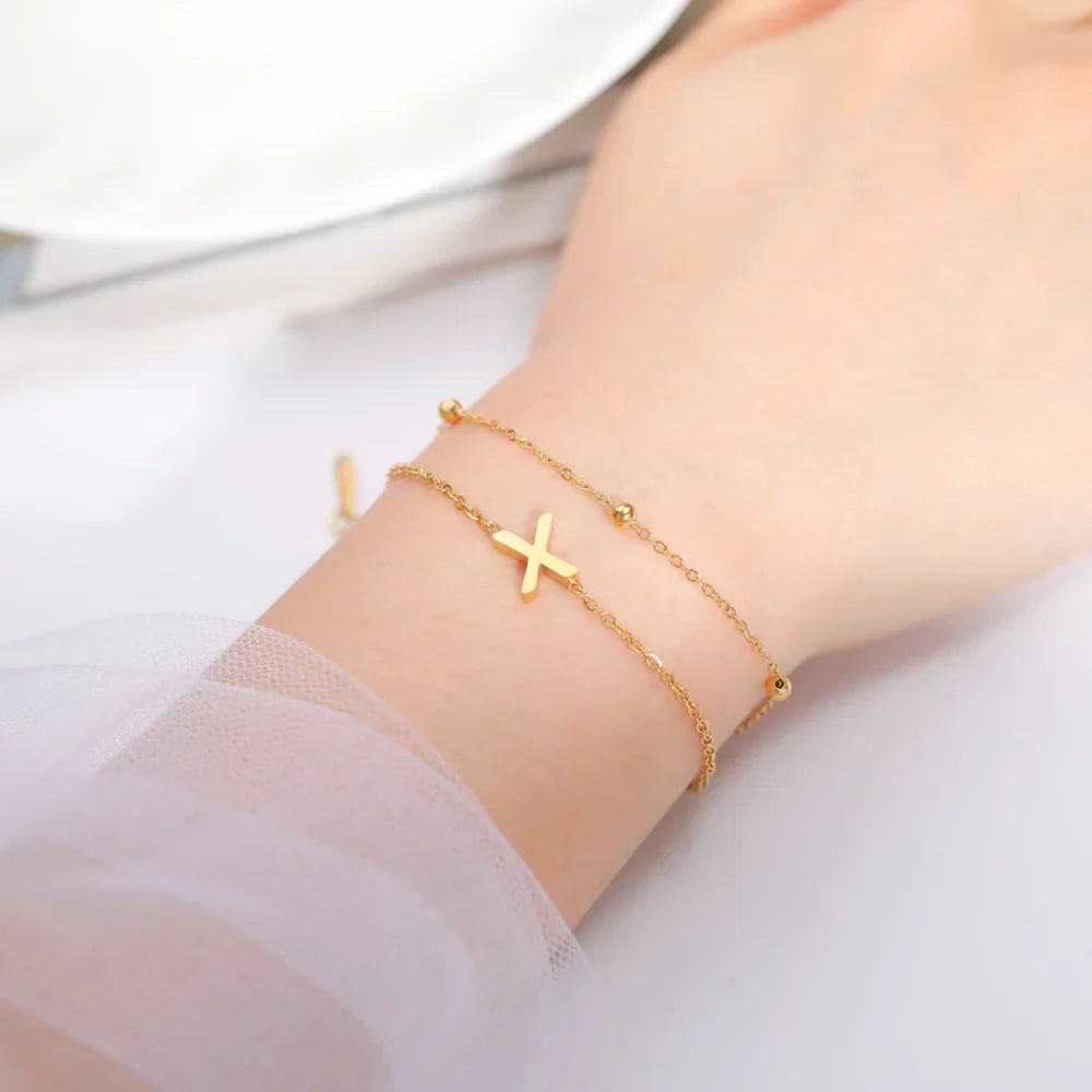 Double initial bracelet in gold 