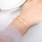 Double initial bracelet in gold 