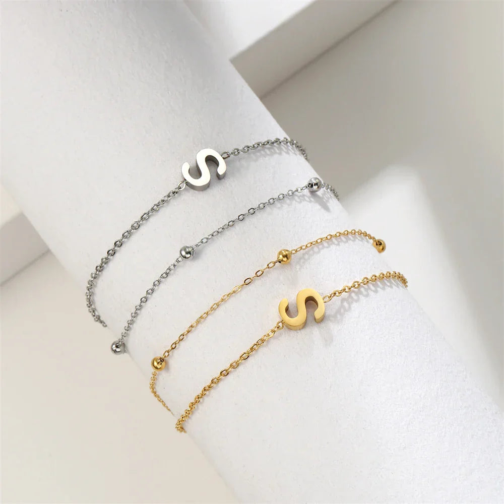 Double initial bracelet in gold and silver  s