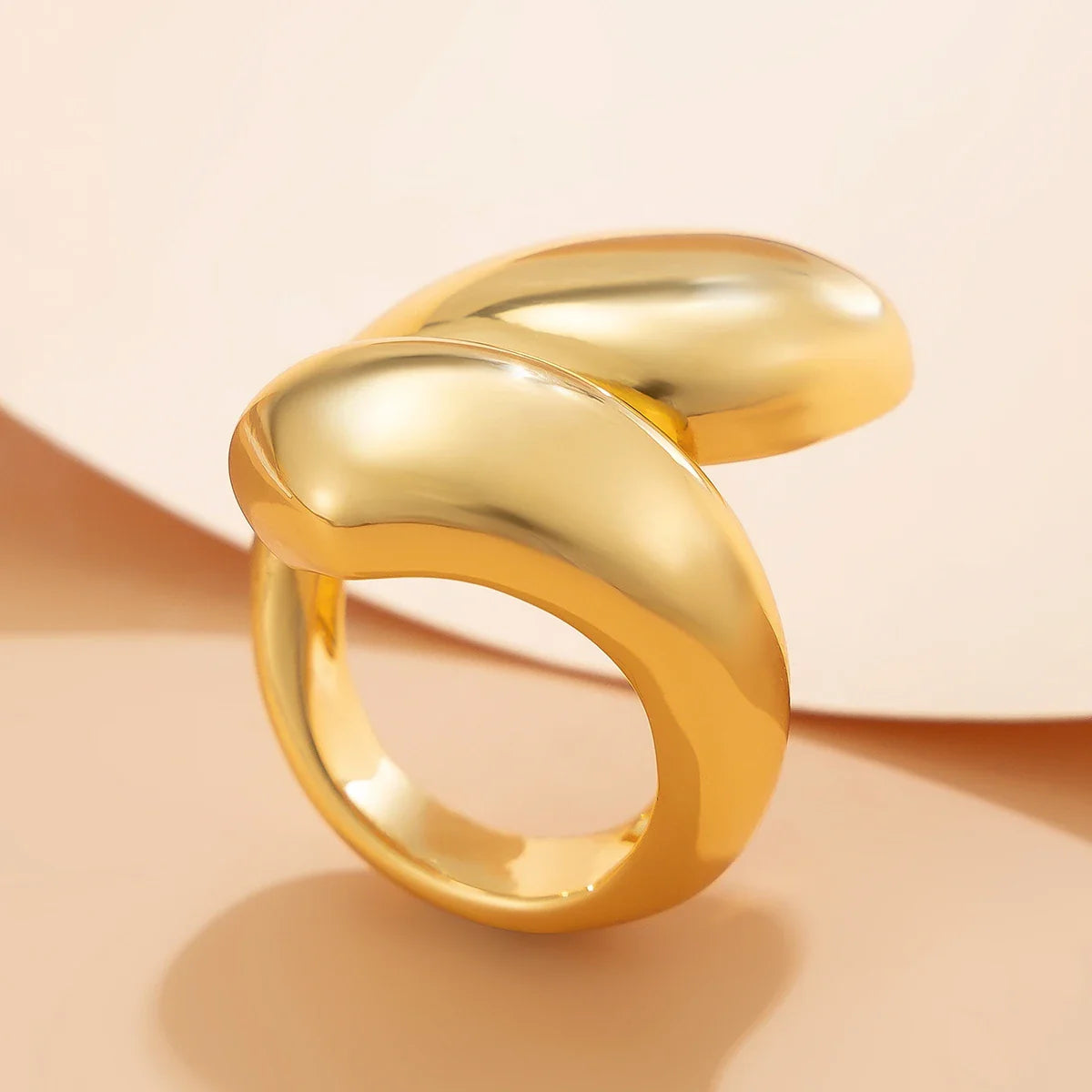 Large Asymmetric Teardrop Ring in Gold