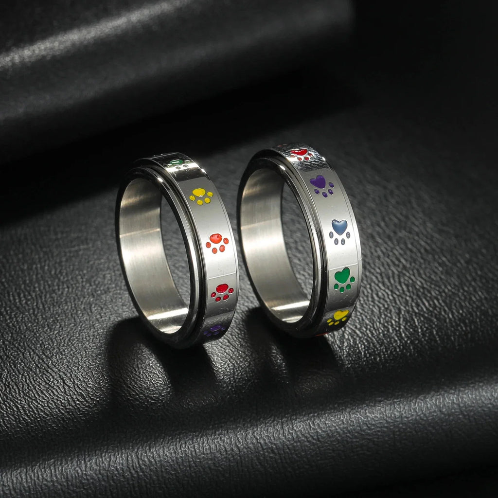 Ring with Hearts or Rotating Anti-Stress Paw Band paws