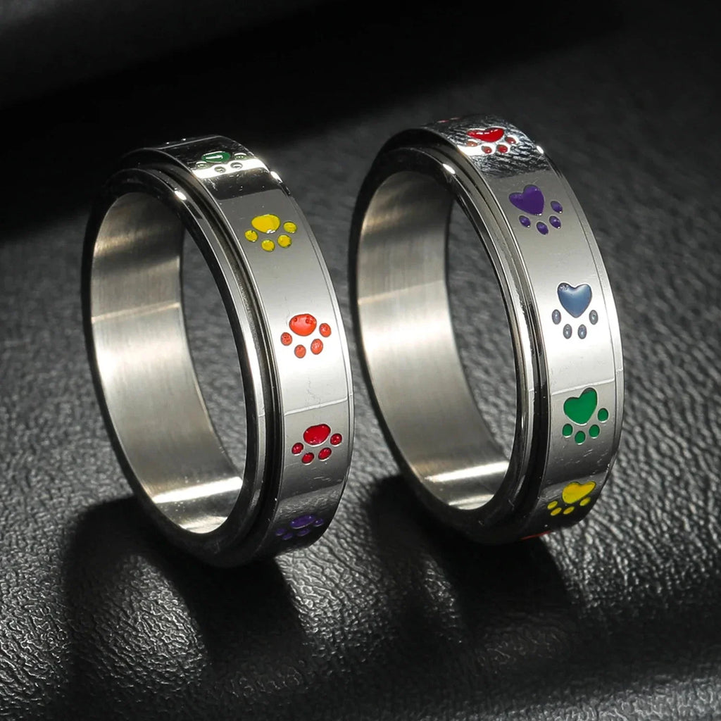 Ring with Hearts or Rotating Anti-Stress Paw Band paws