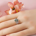 Ring with Green Zircon Hearts and 3-Leaf Clover