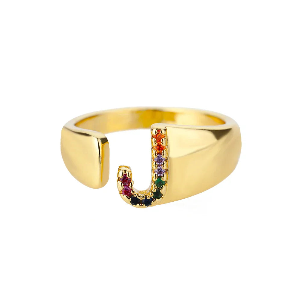 Wide personalized ring with rainbow initial j