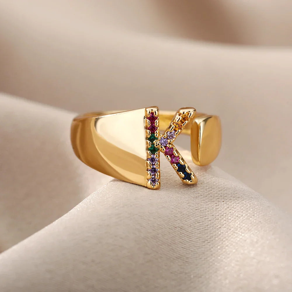 Wide personalized ring with rainbow initial