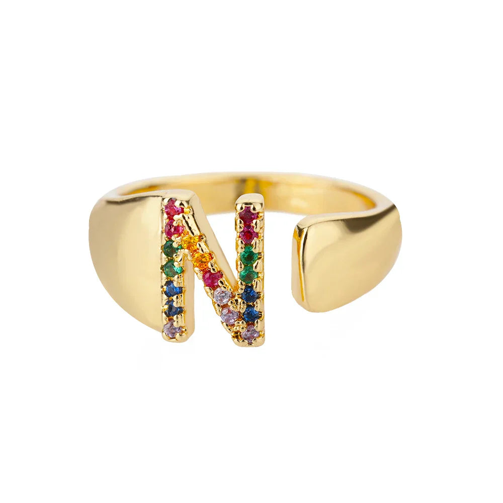 Wide personalized ring with rainbow initial n