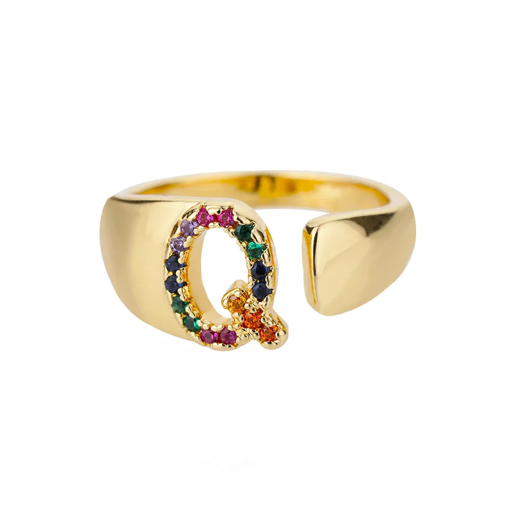 Wide personalized ring with rainbow initial q