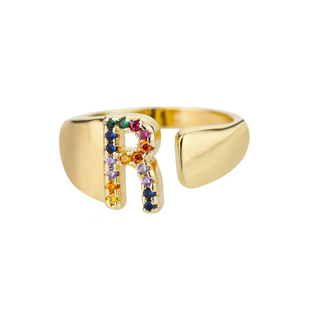 Wide personalized ring with rainbow initial r