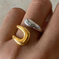 Gold and Silver Ring with Hollow Teardrop Design