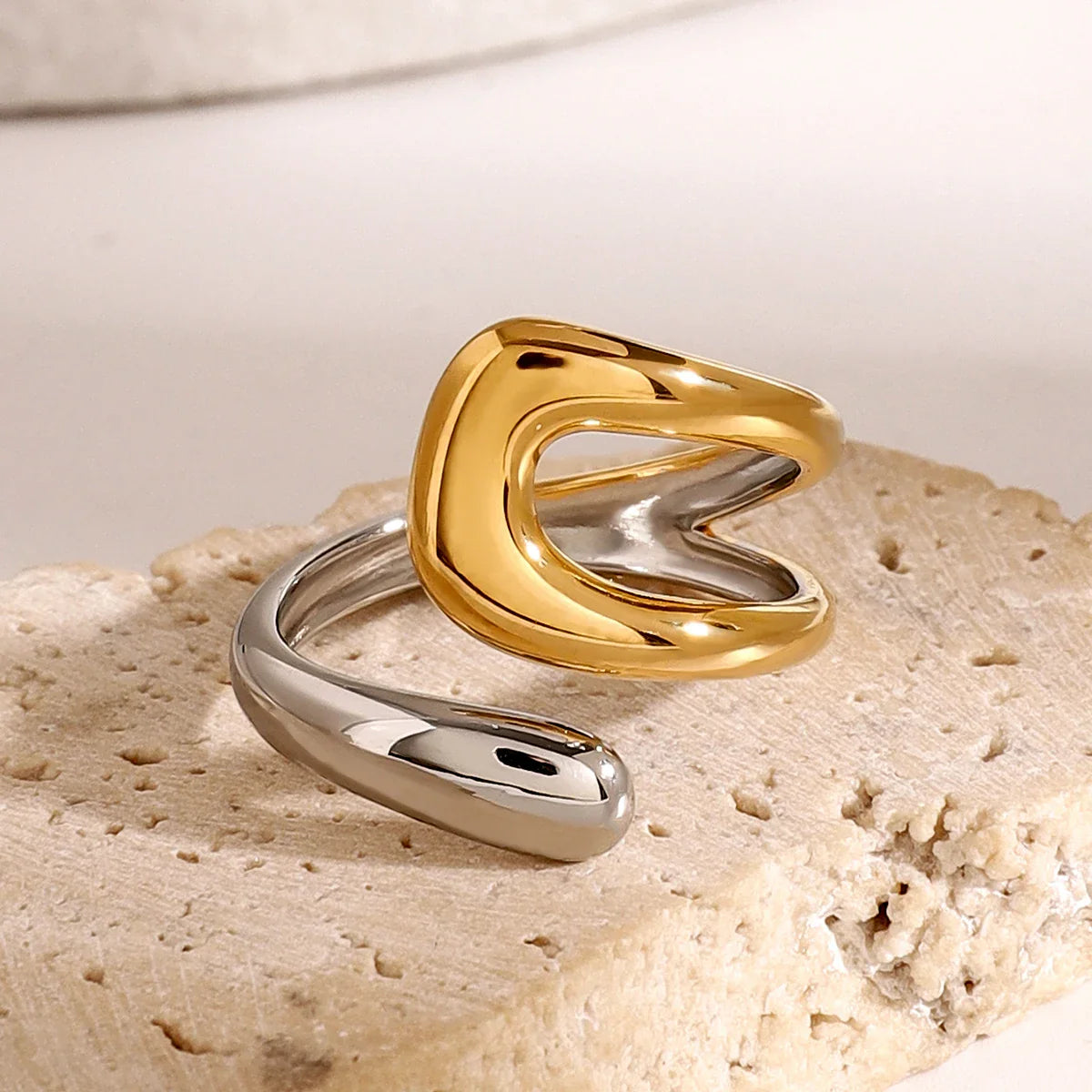 Gold and Silver Ring with Hollow Teardrop Design