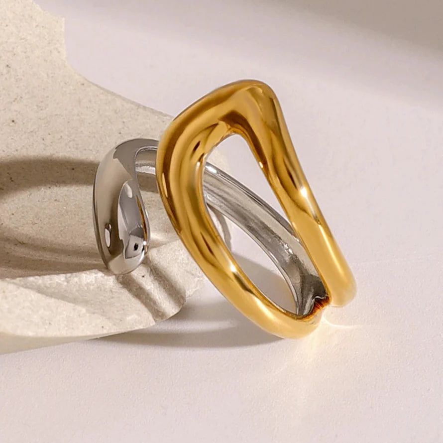 Gold and Silver Ring with Hollow Teardrop Design