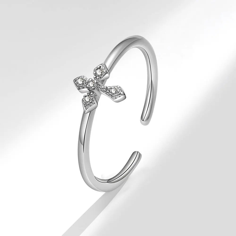 Elegant Ring with Zircon Cross