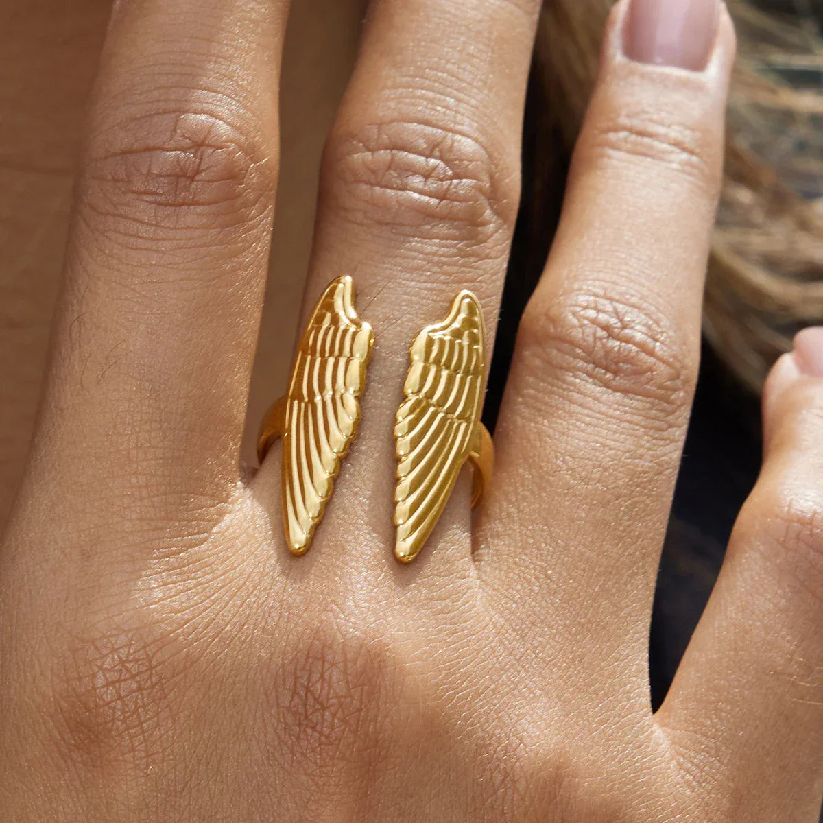 Wide angel wing ring