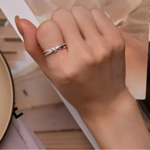 Silver knot and rhinestone ring