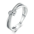 Silver knot and rhinestone ring