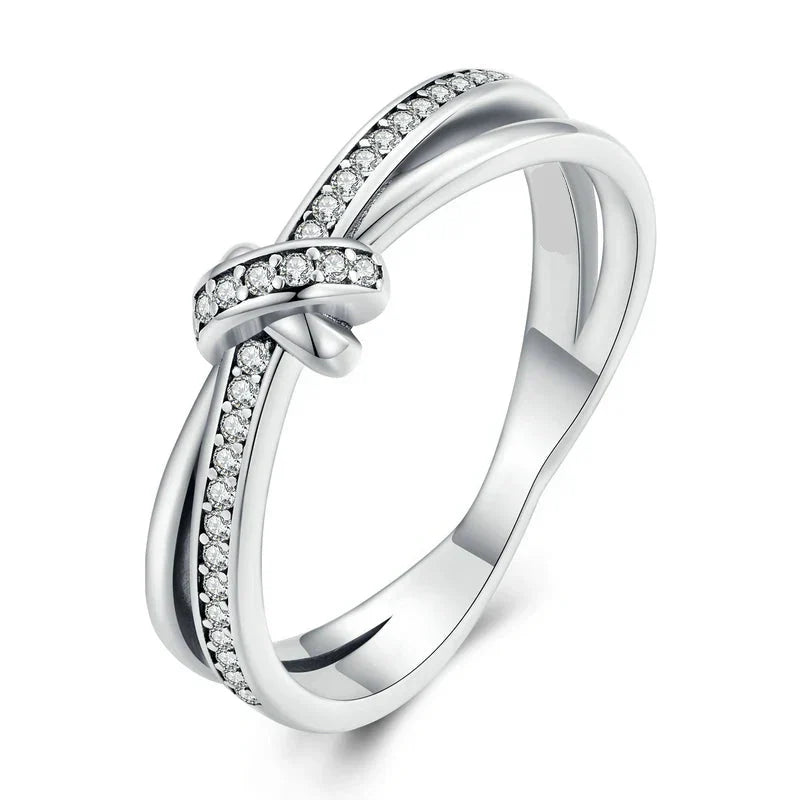Silver knot and rhinestone ring