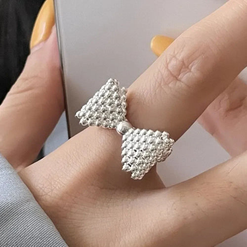 Bow tie and pearl ring