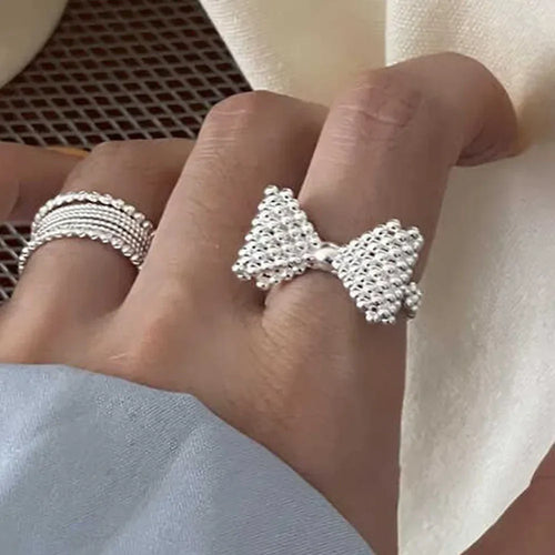 Bow tie and pearl ring