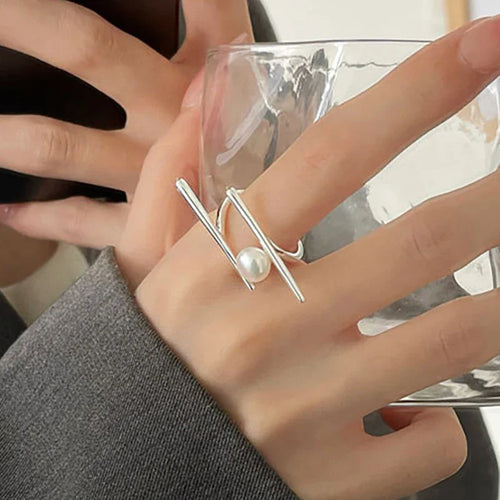 Stylish Ring with White Pearl in Zircon