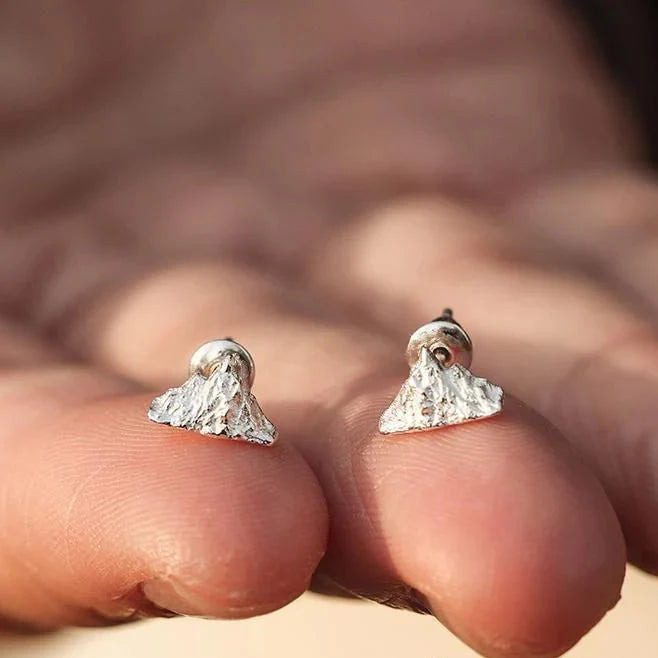 Silver Mountain Stud Earrings


Material: steel


Colors: silver


Size: 1 cm diameter (see image)


Hypoallergenic guaranteed, suitable for men, women, boys, or girls


Very finely crafted product