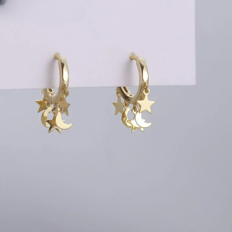 Star and Moon Dangle Hoop Earrings in gold