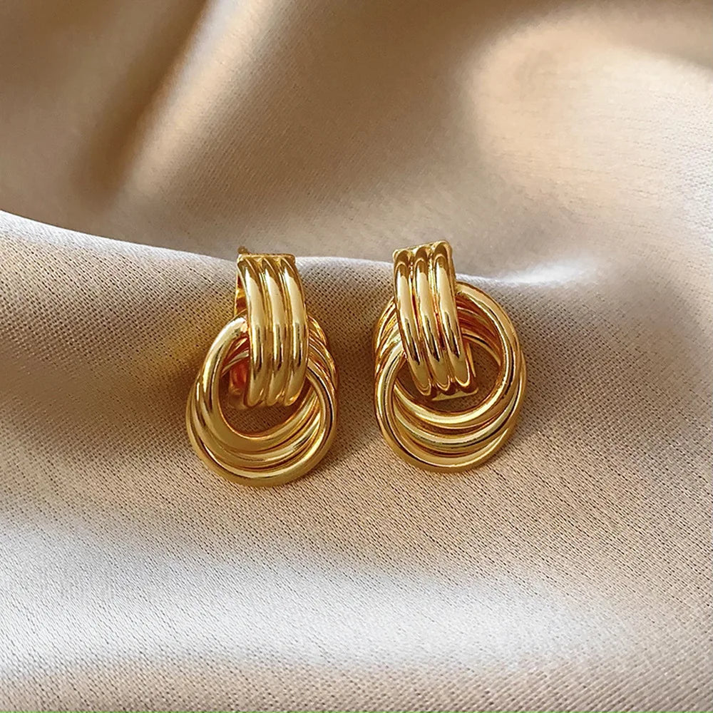 Women's gold bow earrings