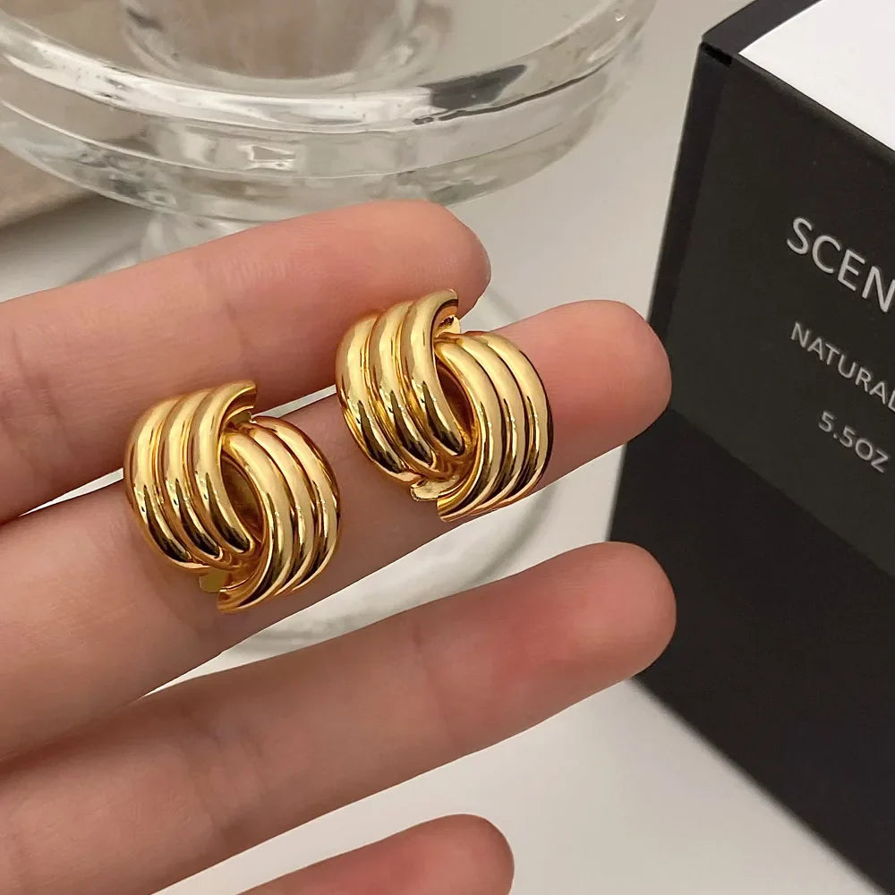 Women's gold bow earrings