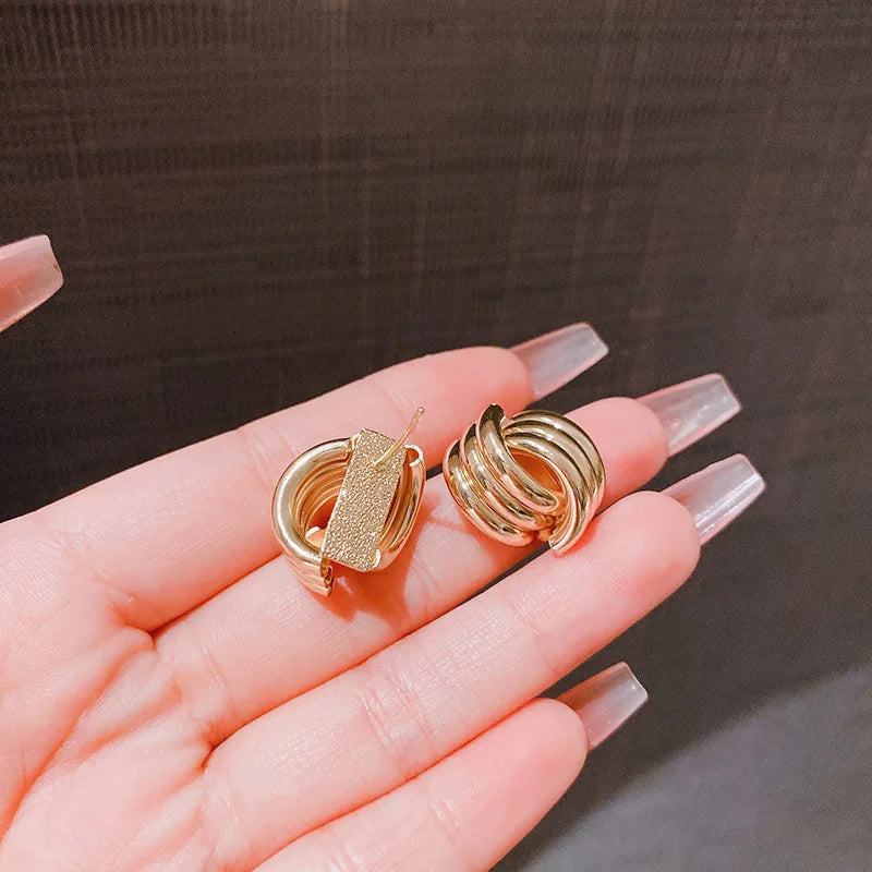 Women's gold bow earrings