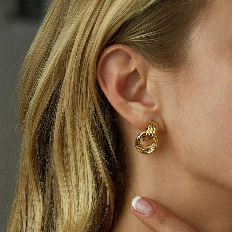 Women's gold bow earrings