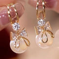 Dangling Earrings with Bow Knot and Pearl