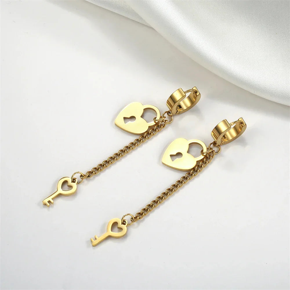 Gold key and lock drop earrings
